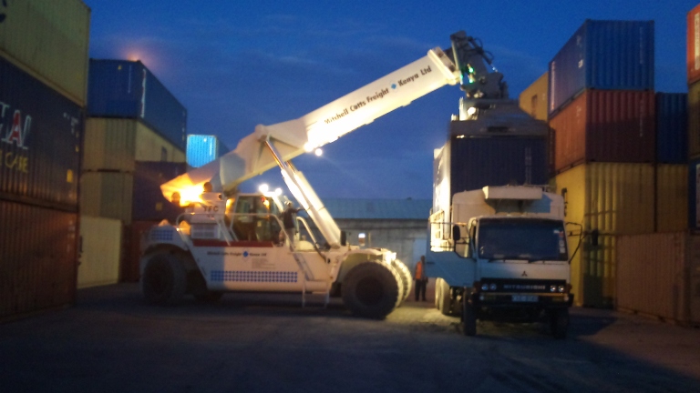 The container finally got loaded onto a truck