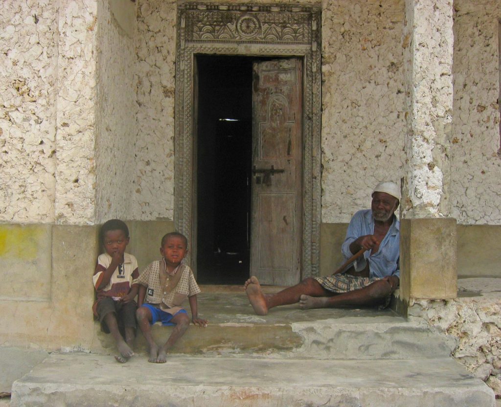 People in front of their house in Jambiani Village