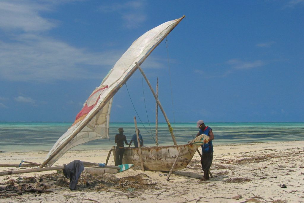 Jambiani – fishermen working on a dhow