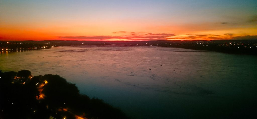 Kinshasa – Sunset on the Congo River. Kinshasa to the left, Brazzaville to the right