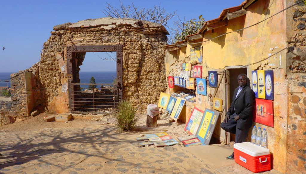 Ile de Goree - An artist displaying his works near the top of the hill