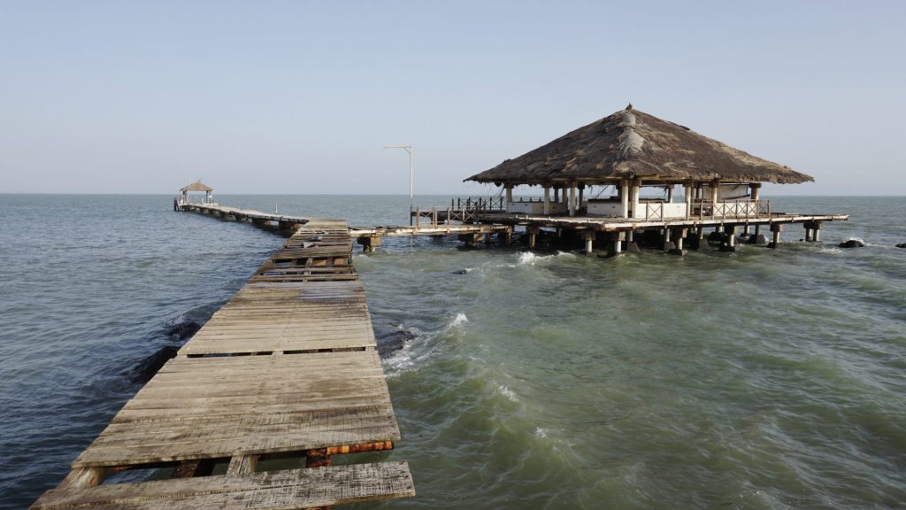 Sali, Senegal - Pontoon pier with an abandoned restaurant